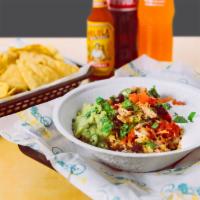 Baja Bowl · Rice, choice of beans, meat, cheese, and pico de gallo. Like a burrito without the tortilla!