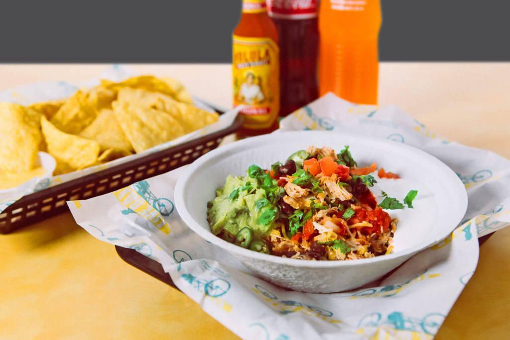 Baja Bowl · Rice, choice of beans, meat, cheese, and pico de gallo. Like a burrito without the tortilla!