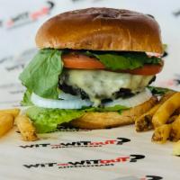 Classic Cheese Burger · Rib eye burger with American, Whiz or Provolone, witz or witzout onions.