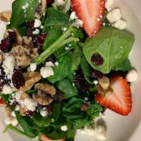 Spinach Salad · Spinach, Walnuts, Craisins, Strawberries, Topped with Feta.