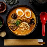 Miso Ramen · Egg,  Pork Chashu，wakame , bamboo shoots and scallion.with miso style