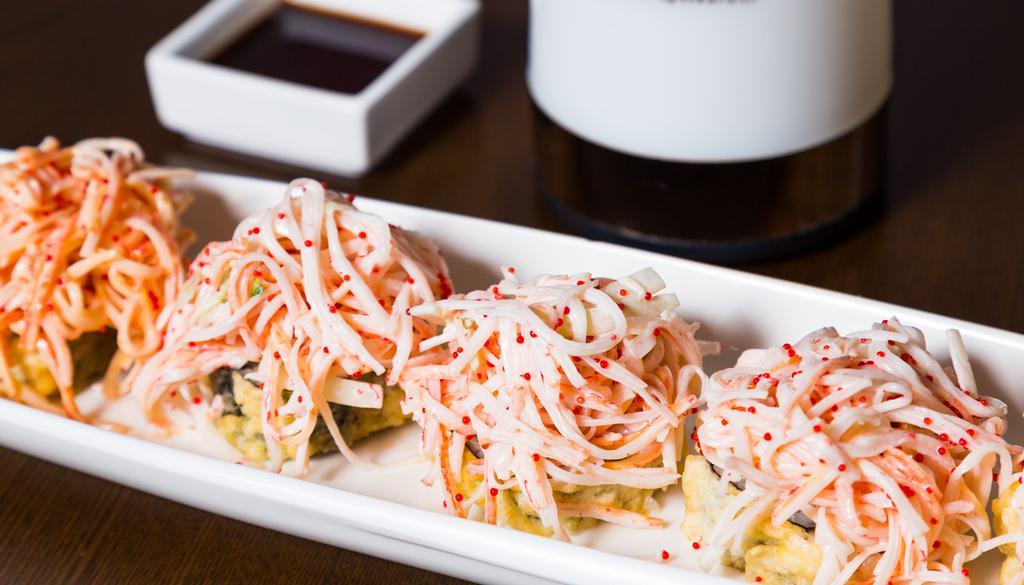 Met Roll · Chopped crab, cucumber and spicy mayo topped on deep fried spicy tuna roll.