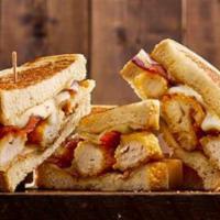Chicken Strips Melt Sandwich · Crispy chicken strips, applewood smoked bacon, and melted pepper jack cheese with ranch dres...