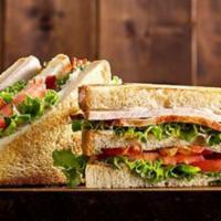 Triple Decker Club Sandwich · Butterball oven roasted turkey, applewood smoked bacon, tomato, lettuce, and mayonnaise on w...