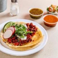 Chorizo Taco (3 Pieces) · Traditional Mexican sausage, tacos topped with fresh onions and cilantro, garnish with a lim...
