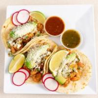 Grilled Shrimp Taco (3 Pieces) · Topped with pico de gallo, avocado, and Cotija cheese, tacos topped with fresh onions and ci...