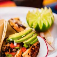 Grilled Fish Taco (3 Pieces) · Topped with pico de gallo, avocado, and Cotija cheese, tacos topped with fresh onions and ci...