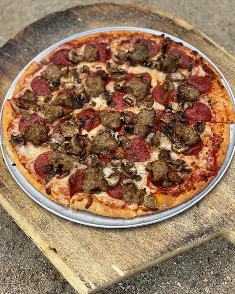 Jimmy's Favorite Pizza · Pepperoni, sausage & mushroom.