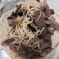 Brisket and Egg Taco · Wood-smoked beef brisket chopped and served on tortilla with your choice of eggs, onions, ch...