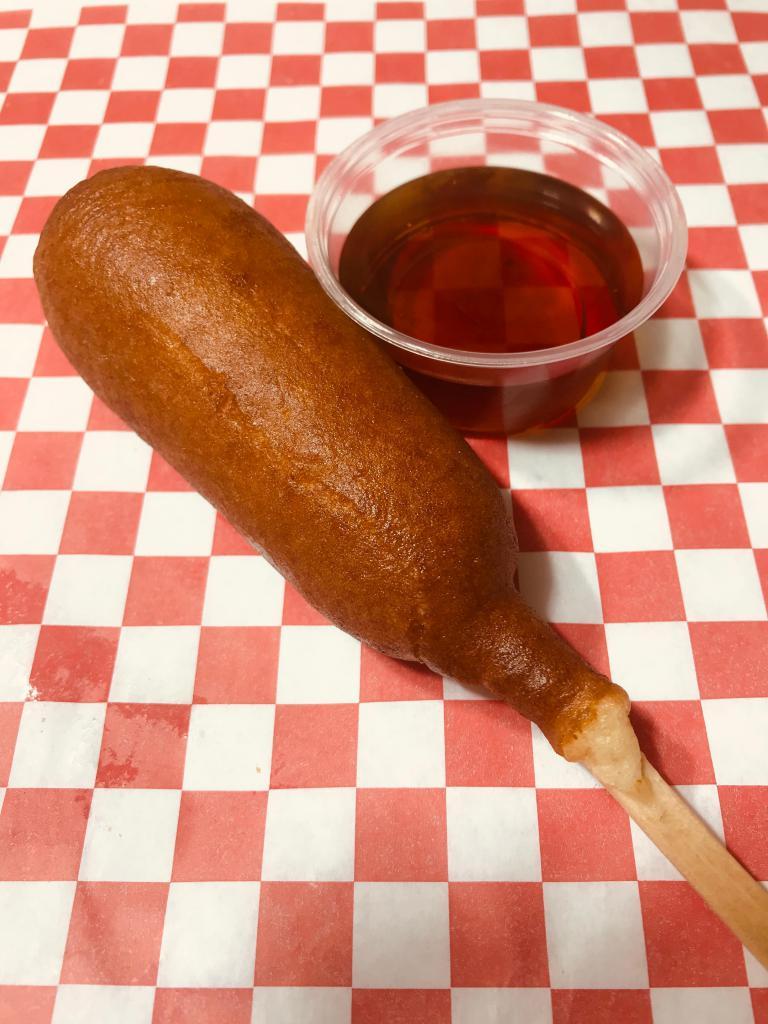 Pancake Sausage on a Stick · 1 premium sausage link on a stick, dipped in sweet pancake batter and later fried to perfection and served with syrup for your dipping gratification.