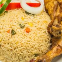 Coconut Rice · Rice cooked with coconut cream, coconut oil, red bell pepper, onion, hot pepper, crayfish an...