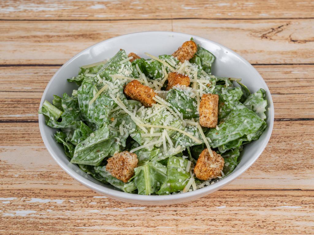 Caesar Salad · Crispy romaine, Parmesan cheese, croutons and Caesar dressing.