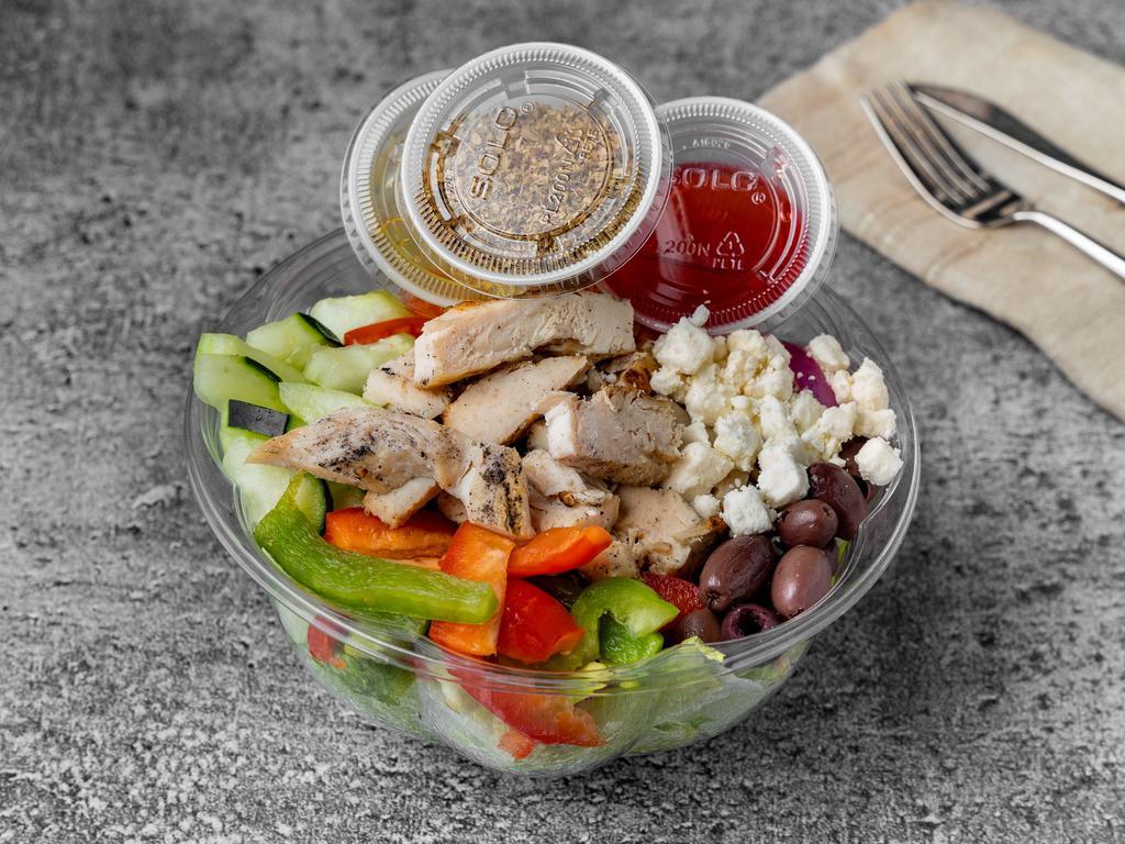 Grilled Chicken Greek Salad · Grilled chicken, romaine lettuce, tomatoes, bell peppers, onions, kalamata, olives, cucumbers, oregano, olive oil, wine vinegar, and feta cheese. 