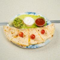 Cheese Quesadilla · Cheddar, mozzarella, salsa, sour cream, and guacamole.