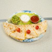 Shrimp Quesadilla · Shrimp, salsa, sour cream, and guacamole.