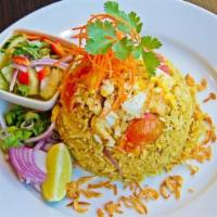 Thai Fried Rice · Stir-fried rice with onions, tomatoes, and egg (choice of chicken, beef, or tofu). Extra pro...
