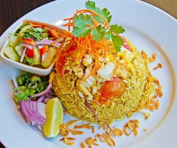 Thai Fried Rice · Stir-fried rice with onions, tomatoes, and egg (choice of chicken, beef, or tofu). Extra protein for an additional charge.