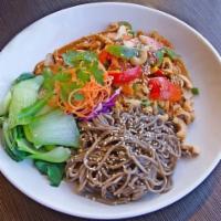 Udon Cashew Noodle · Stir-fried udon noodles with chicken, egg, napa cabbage, bok choy, carrots, sesame, mushroom...