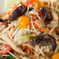 Papaya Salad Soft Shell Crab · Traditional papaya with tomatoes, carrots, green bean, chili, garlic, and peanuts. Contain f...