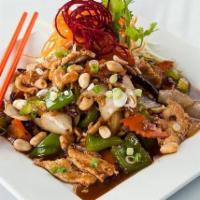Kung Pao Stir-Fried Dinner · Stir-fried chicken with bell pepper, onion, carrot, roasted chili, and peanuts.