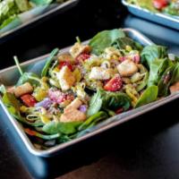 Sabino's Favorite Salad · Lovely bed of spinach topped with red onions, tomatoes, pepperoncinis, green olives, parmesa...