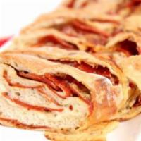 1/2 Pepperoni Roll · Added by popular demand! 
Pepperoni, house cheese blend, garlic butter and sides of red sau...