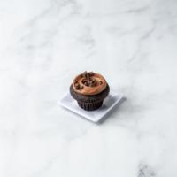 Triple Threat Cupcake · A chocolate cake frosted with chocolate buttercream and then we add dark chocolate curls. Fo...