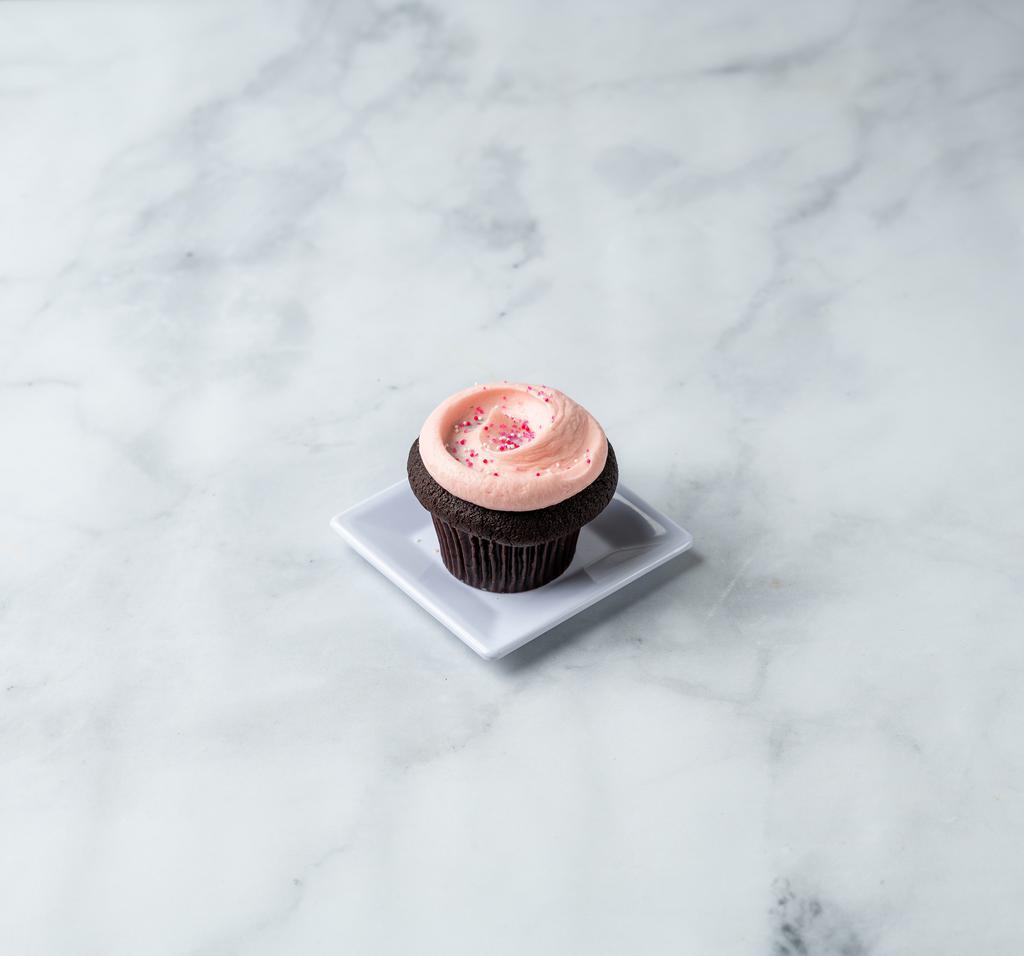 The Kate Cupcake · Pink vanilla buttercream atop chocolate cake, sprinkled with fun pink and white sprinkles makes what may be the perfect treat.