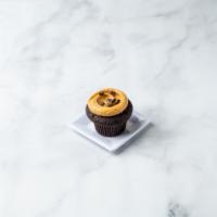 Salted Caramel Cupcake · Chocolate cake royale topped with house-made caramel buttercream, fleur de sel and dark choc...