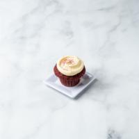 Red Velvet Cupcake · A classic southern buttermilk cake with a hint of cocoa. Topped off with a rich pile of crea...