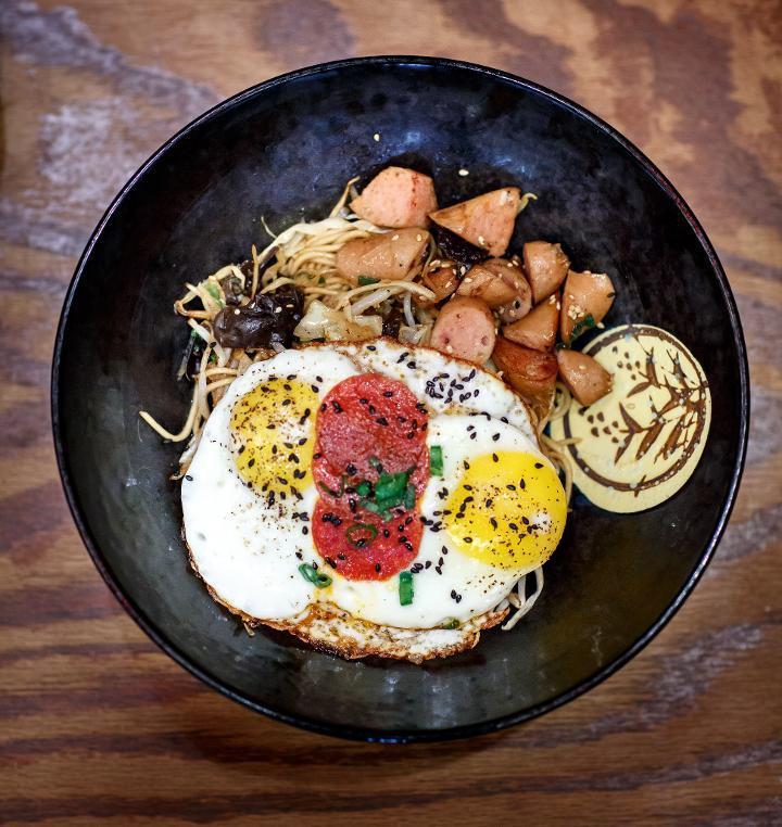Pork Yaki Soba · Our handmade ramen noodles pan fried in organic duck oil with kikurage, scallion, cabbage, bean sprouts, fried egg and your choice of meat. All choices accompanied by a side of dashi broth with scallion and narutomaki.