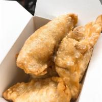 8 Chicken potstickers  · Deep fried chicken potstickers served with sweet chili sauce 