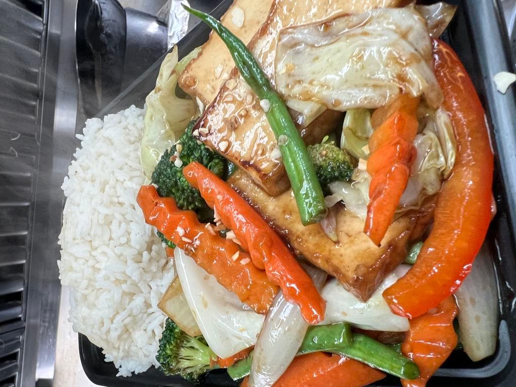 Pad Pak (Mixed Vegetable Stir Fried) · Stir fried broccoli, cabbage, carrot, onion and string bean with special garlic sauce served with jasmine rice.(rice on the side) 