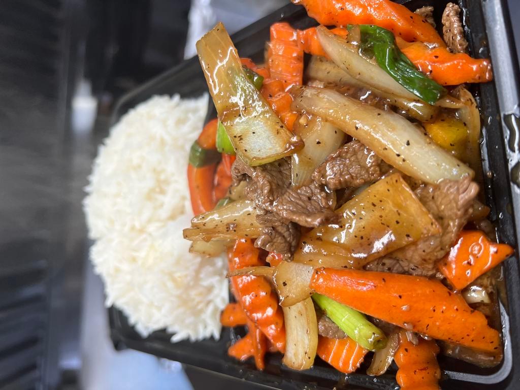 Black Pepper Beef · Stir fry beef with onion, black pepper, bell pepper, green onion and carrot served with. Jasmine rice.(rice on the side)