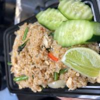 Basil fried rice · with egg, green bean, onion, red bell pepper, basil leaves topped with cucumber and lime