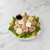 1. Chef Salad · Roast beef, ham, Oven Gold turkey, Swiss cheese, boiled egg, over salad greens with balsamic...