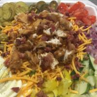 Crispy Fried Chicken Salad · Lettuce,tomatoes, cucumbers, jelepeno peppers, banana peppers, olives,pickles,red onions, eg...
