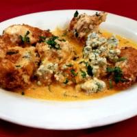 Patrizia's Special Buffalo Wings · 8 pieces. Cooked wing of a chicken coated in sauce or seasoning. Served with homemade sauce.