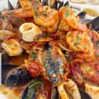 Black Fettuccine Pescatore · Comes with calamari, shrimp, baby clams, lobster, mussels and fresh homemade tomato sauce. 
