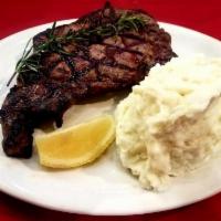 16 oz. Rib-Eye · Charcoal-grilled and served with mashed potato. 