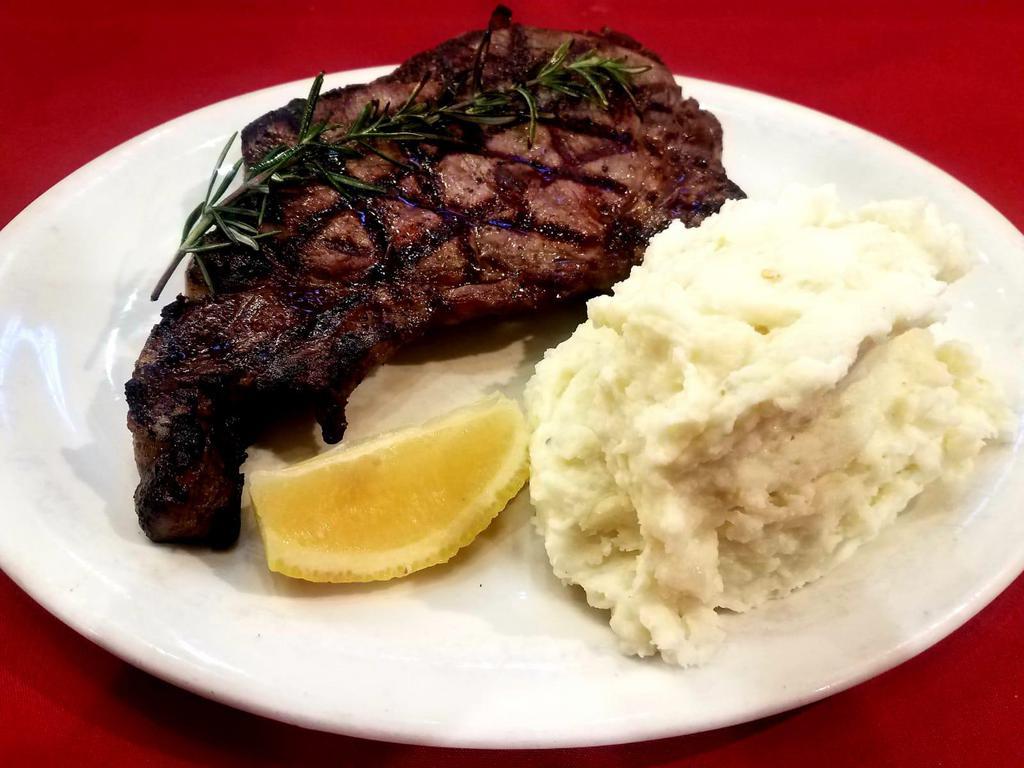 16 oz. Rib-Eye · Charcoal-grilled and served with mashed potato. 