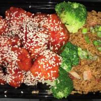 C23. Sesame Chicken Combo · Served in a sweet sauce served with sesame seeds.