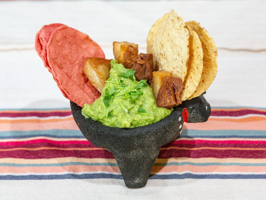 Guacamole Regular · Served with tostadas.