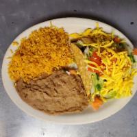 Beef Taco Plate · Beef Tacos served with rice and beans.
