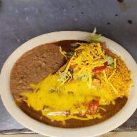 Barbara Special · 2 enchilada puffy taco with rice and beans. Weekends crispy taco.