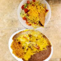Gilberts Special · Served with 1 cheese enchilada 1 tamale 1 crispy taco 1 chalupa rice and beans