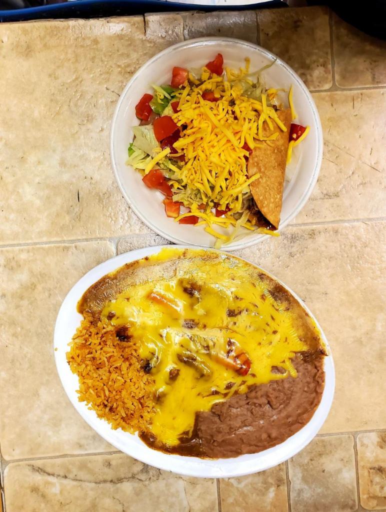 Gilberts Special · Served with 1 cheese enchilada 1 tamale 1 crispy taco 1 chalupa rice and beans