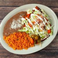 Enchiladas Michoacanas · A house favorite! These Michoacan style enchiladas are prepared with corn tortillas dipped i...