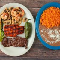 Cielo, Mar, Y Tierra · Grilled chicken, 4 prawns, and carne asada. Served with pico de gallo, fried jalapeno, guaca...