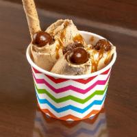 8 oz. Express Yo Self Ice Cream · Coffee ice cream, pirouline, chocolate shavings, chocolate almonds and caramel.
